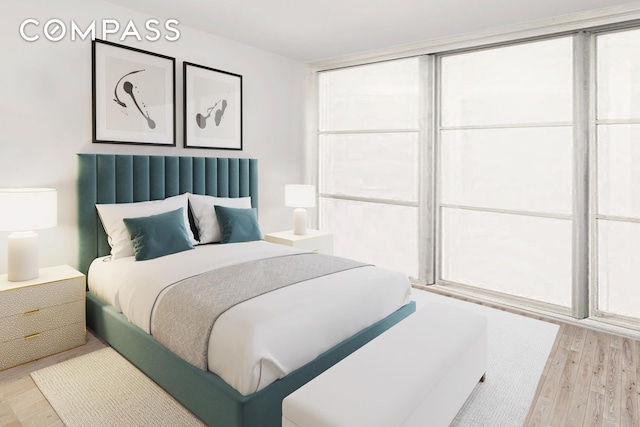 40 Sutton Pl Phm, New York City, NY 10022 - bedroom featuring multiple windows and light wood-type flooring