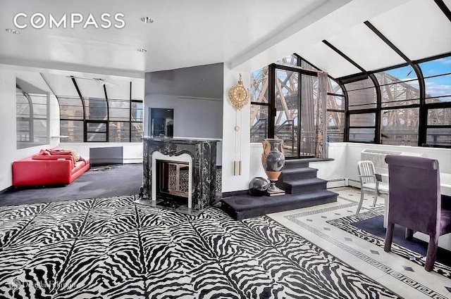 40 Sutton Pl Phm, New York City, NY 10022 - carpeted living room with a sunroom, lofted ceiling, and baseboards
