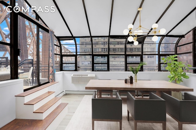 40 Sutton Pl Phm, New York City, NY 10022 - sunroom featuring an inviting chandelier, a baseboard radiator, and a wall mounted AC
