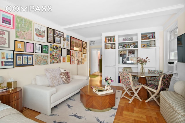 living area with beamed ceiling