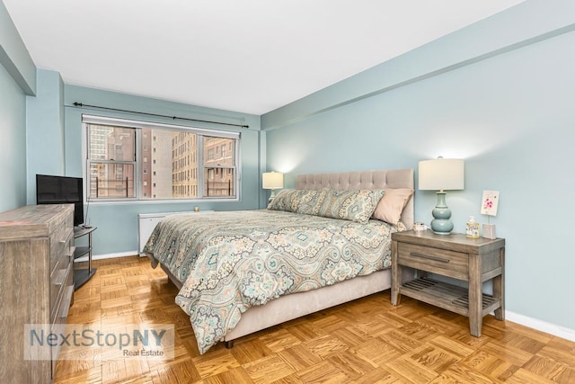 bedroom with baseboards