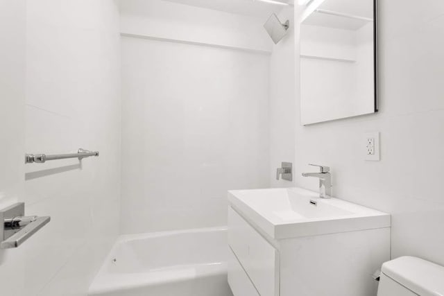 full bath featuring toilet and vanity