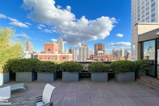 view of patio featuring a view of city