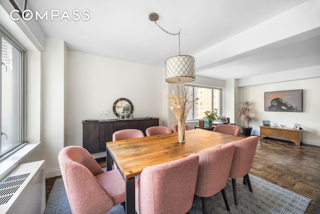 dining room with baseboards