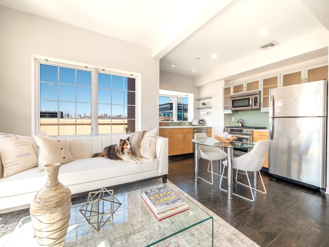 32-86 41st St Unit 5C, New York City, NY 11103 - living area with visible vents, recessed lighting, and dark wood-style flooring