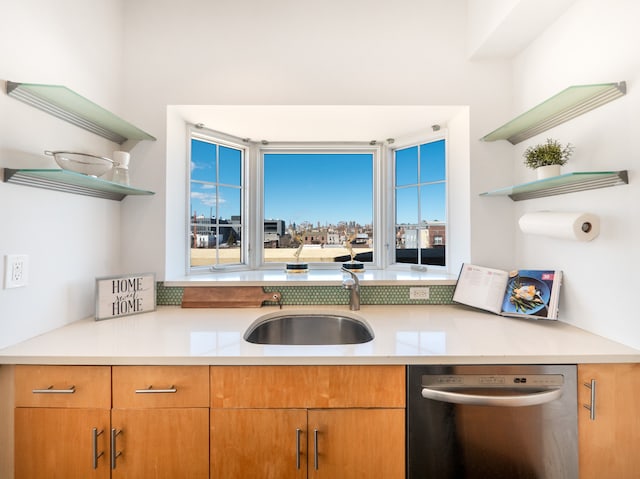 32-86 41st St Unit 5C, New York City, NY 11103 - kitchen featuring open shelves, light countertops, stainless steel dishwasher, and a sink