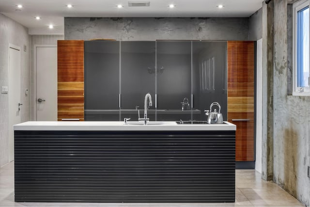 bathroom featuring recessed lighting