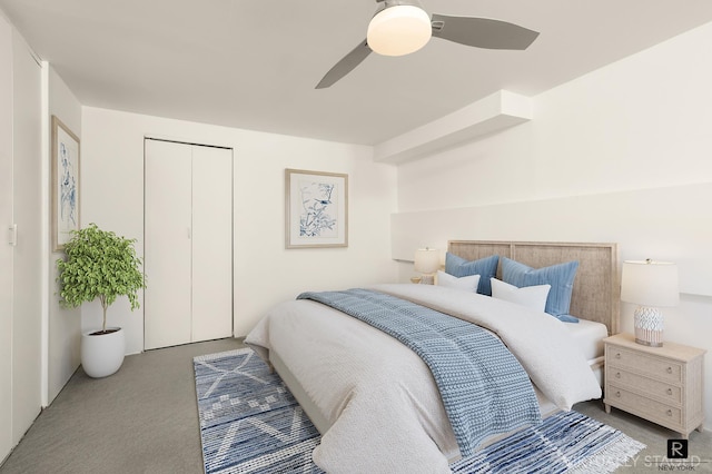 bedroom with a ceiling fan and carpet floors