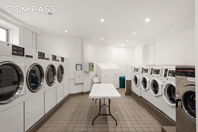 shared laundry area with tile patterned floors, recessed lighting, and washing machine and clothes dryer