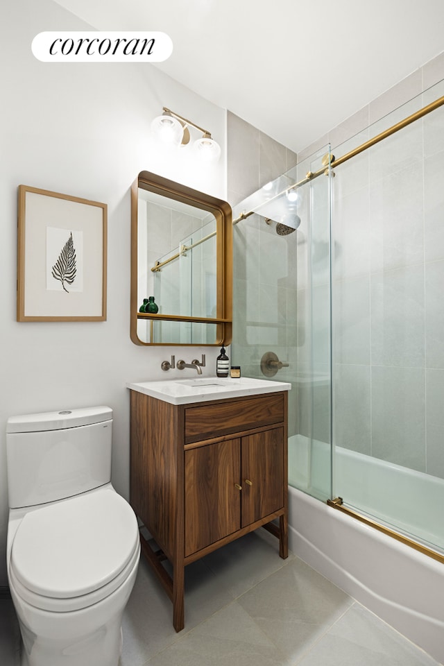 full bath featuring tile patterned flooring, toilet, vanity, and enclosed tub / shower combo