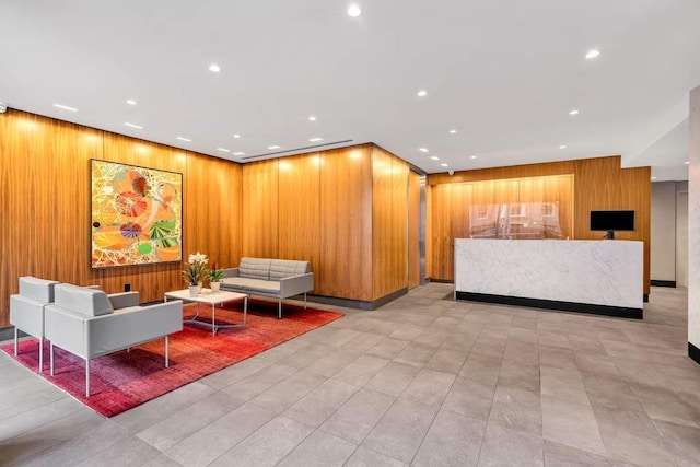 360 W 22nd St Unit 17E, New York City, NY 10011 - reception with wooden walls and recessed lighting