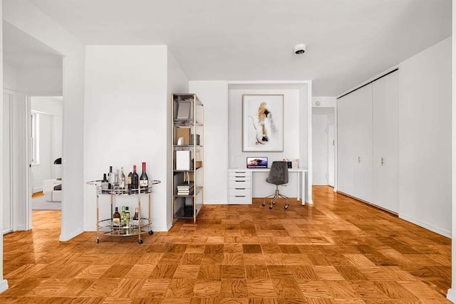 360 W 22nd St Unit 17E, New York City, NY 10011 - hallway with an office area and baseboards