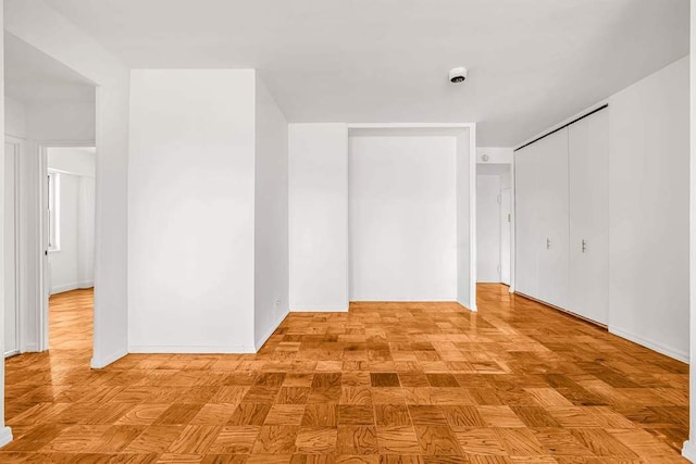 360 W 22nd St Unit 17E, New York City, NY 10011 - spare room featuring baseboards