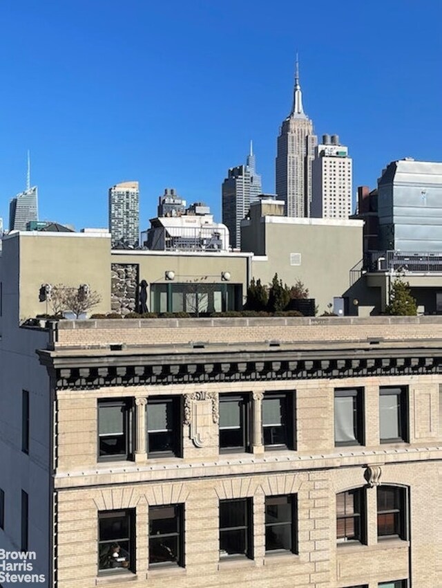 270 W 17th St Unit 14B, New York City, NY 10011 - view of building exterior featuring a skyline view