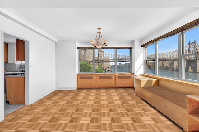 25 Sutton Pl S Unit 6F, New York City, NY 10022 - unfurnished sunroom featuring a water view and a chandelier