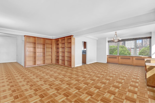 interior space featuring baseboards and an inviting chandelier