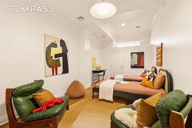 bedroom with visible vents, baseboards, ornamental molding, recessed lighting, and wood finished floors