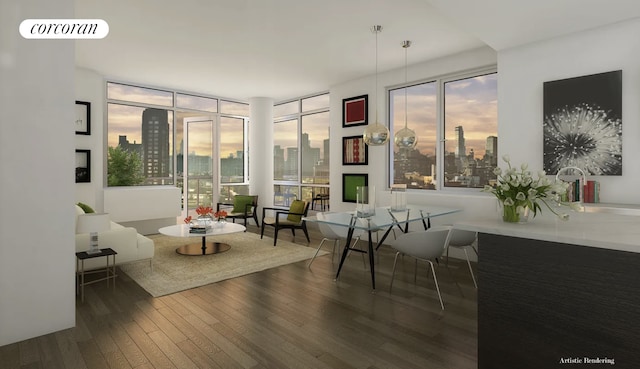 sitting room with a city view, visible vents, and hardwood / wood-style flooring