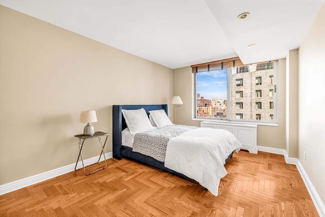 bedroom featuring baseboards