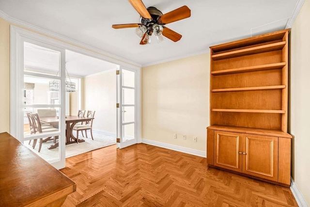 interior space with crown molding and baseboards