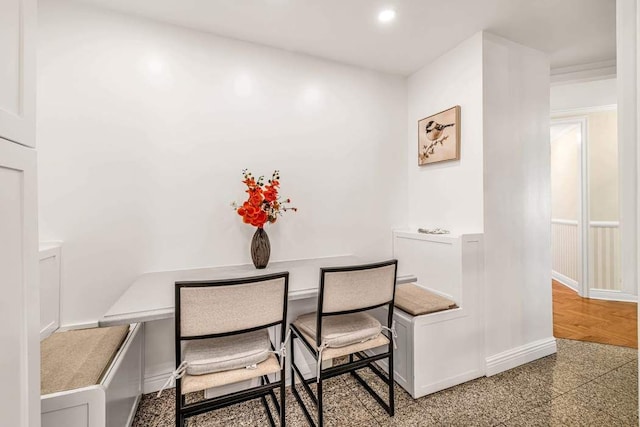 dining room with recessed lighting, baseboards, and granite finish floor