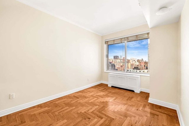 empty room with a city view and baseboards