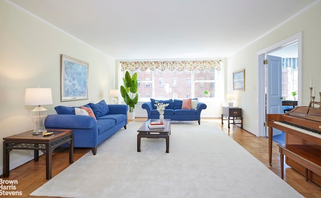 living room with a healthy amount of sunlight and ornamental molding