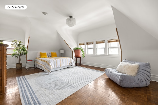 bedroom with visible vents and baseboards