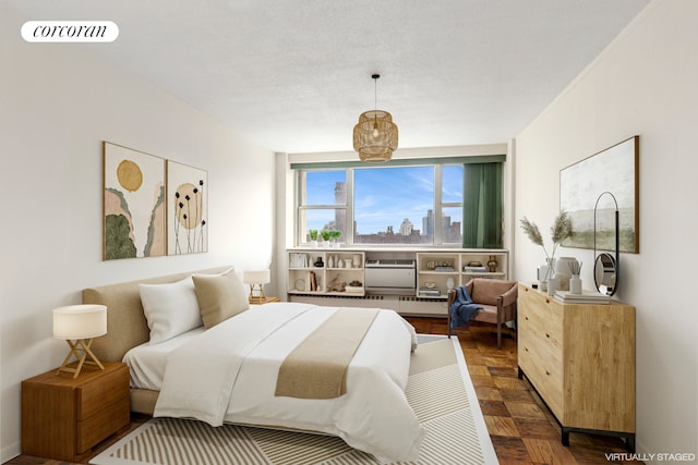 bedroom featuring a city view and visible vents