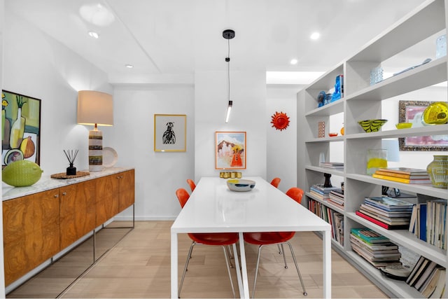 111 E 85th St Unit 10A, New York City, NY 10028 - dining room featuring light wood-style floors, recessed lighting, baseboards, and built in features