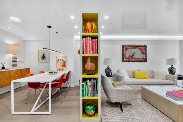 living room featuring wood finished floors and recessed lighting