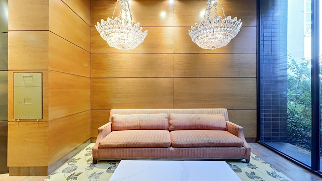 sitting room featuring a chandelier