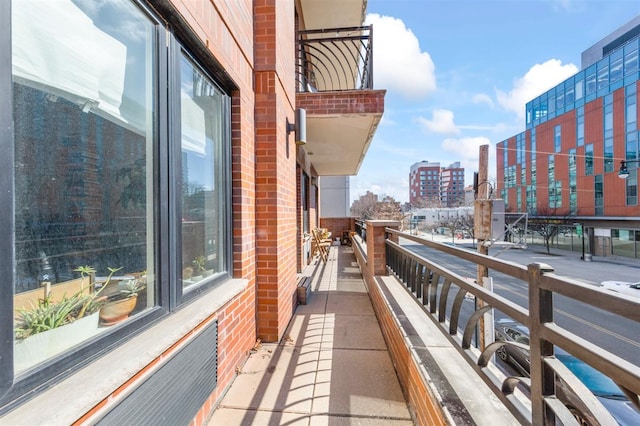 balcony featuring a city view