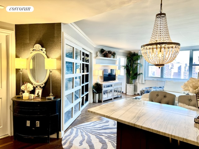 dining space with a notable chandelier, visible vents, crown molding, and dark wood-style floors