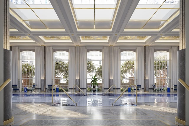 building lobby featuring coffered ceiling