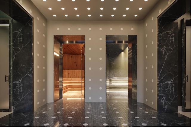 building lobby featuring recessed lighting