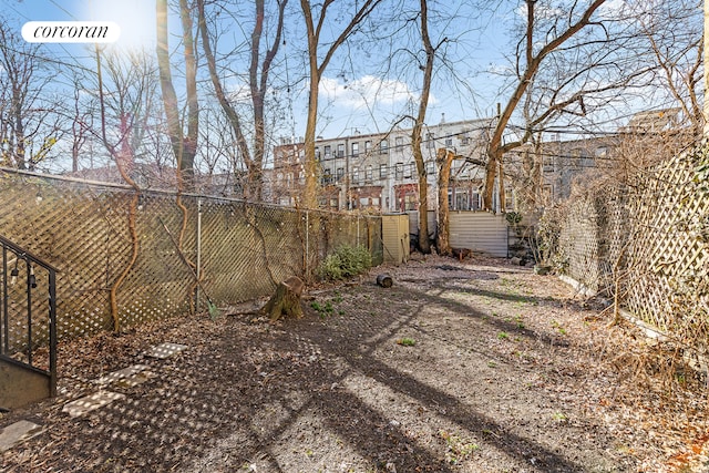 view of yard featuring a fenced backyard