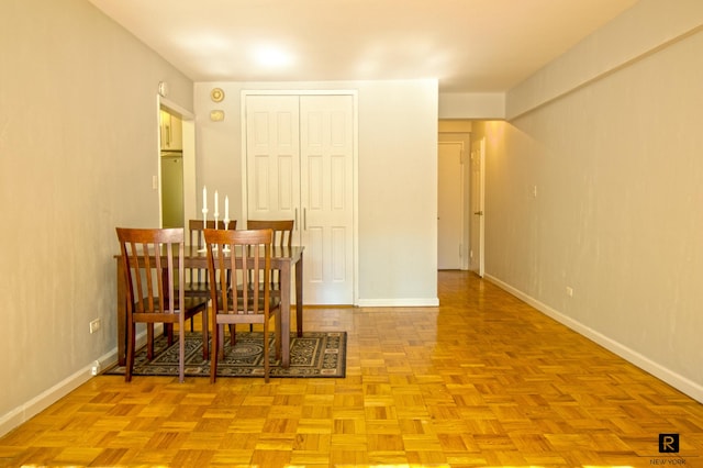 dining space with baseboards