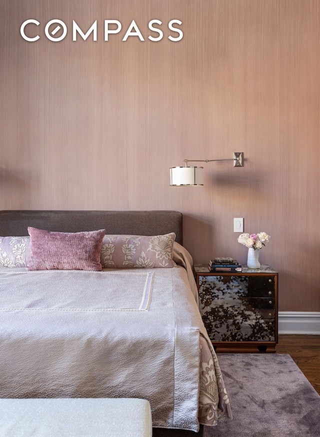 bedroom featuring wood finished floors