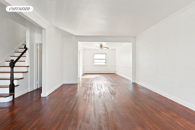 empty room with visible vents, dark wood-style floors, stairs, and a baseboard radiator