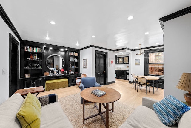 living area with recessed lighting, ornamental molding, bar area, and wood finished floors