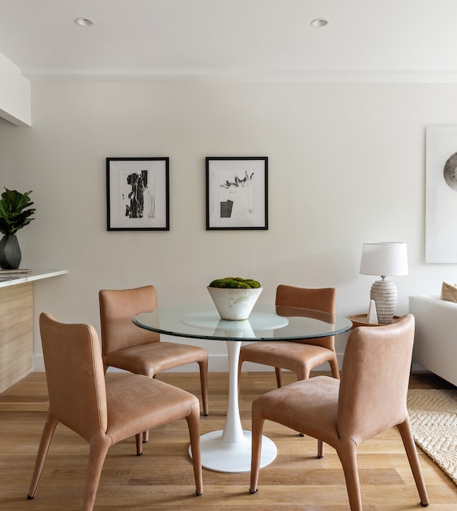 dining area with recessed lighting, light wood-type flooring, and ornamental molding