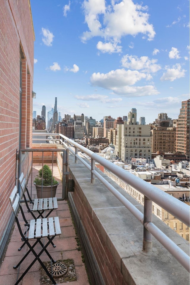 balcony featuring a city view