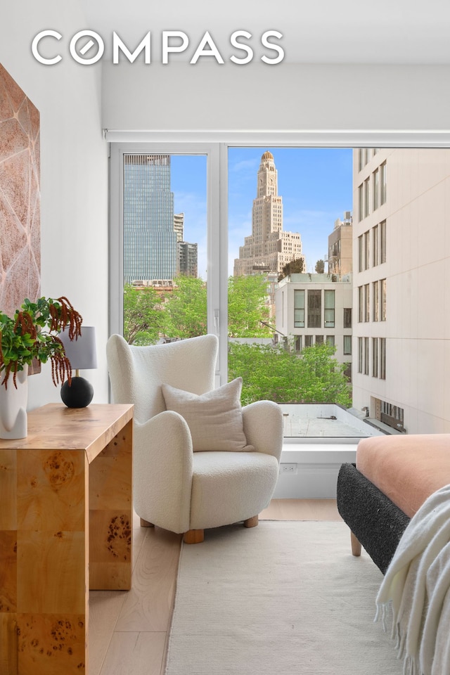 sitting room featuring a city view