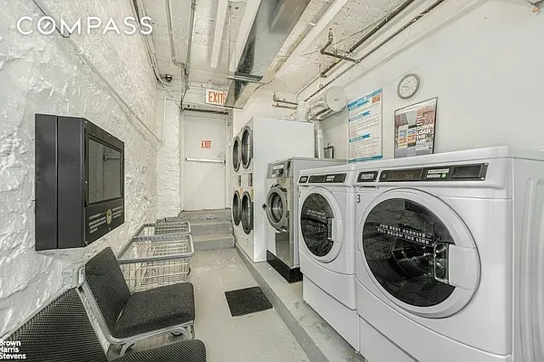 communal laundry room with washer and clothes dryer and stacked washer and clothes dryer