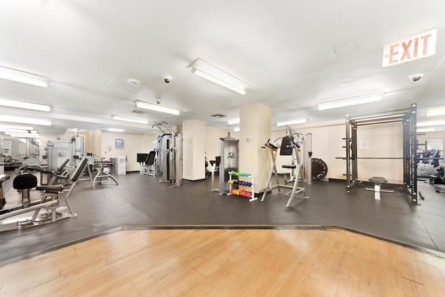 470 W 24th St Unit 4F, New York City, NY 10011 - workout area featuring wood finished floors
