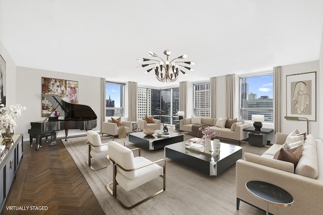 living area featuring a city view, an inviting chandelier, and a healthy amount of sunlight