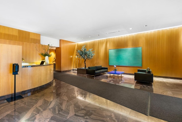 15 W 53rd St Unit 37Af, New York City, NY 10019 - reception area with wooden walls and recessed lighting