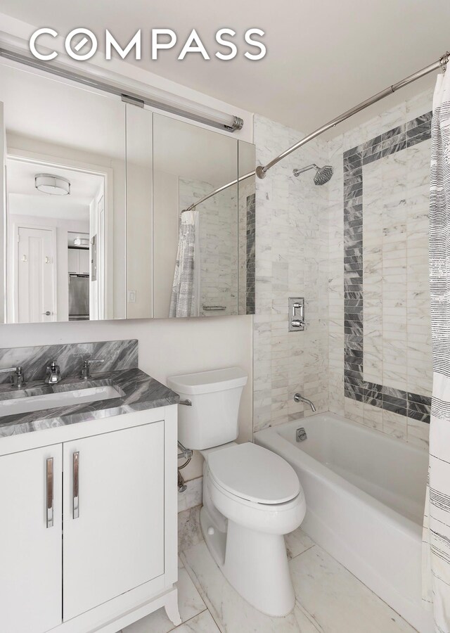 200 E 94th St Unit 420, New York City, NY 10128 - bathroom featuring marble look tiles, shower / tub combo, and vanity