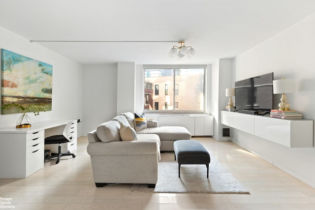 living area with radiator and light wood-style floors